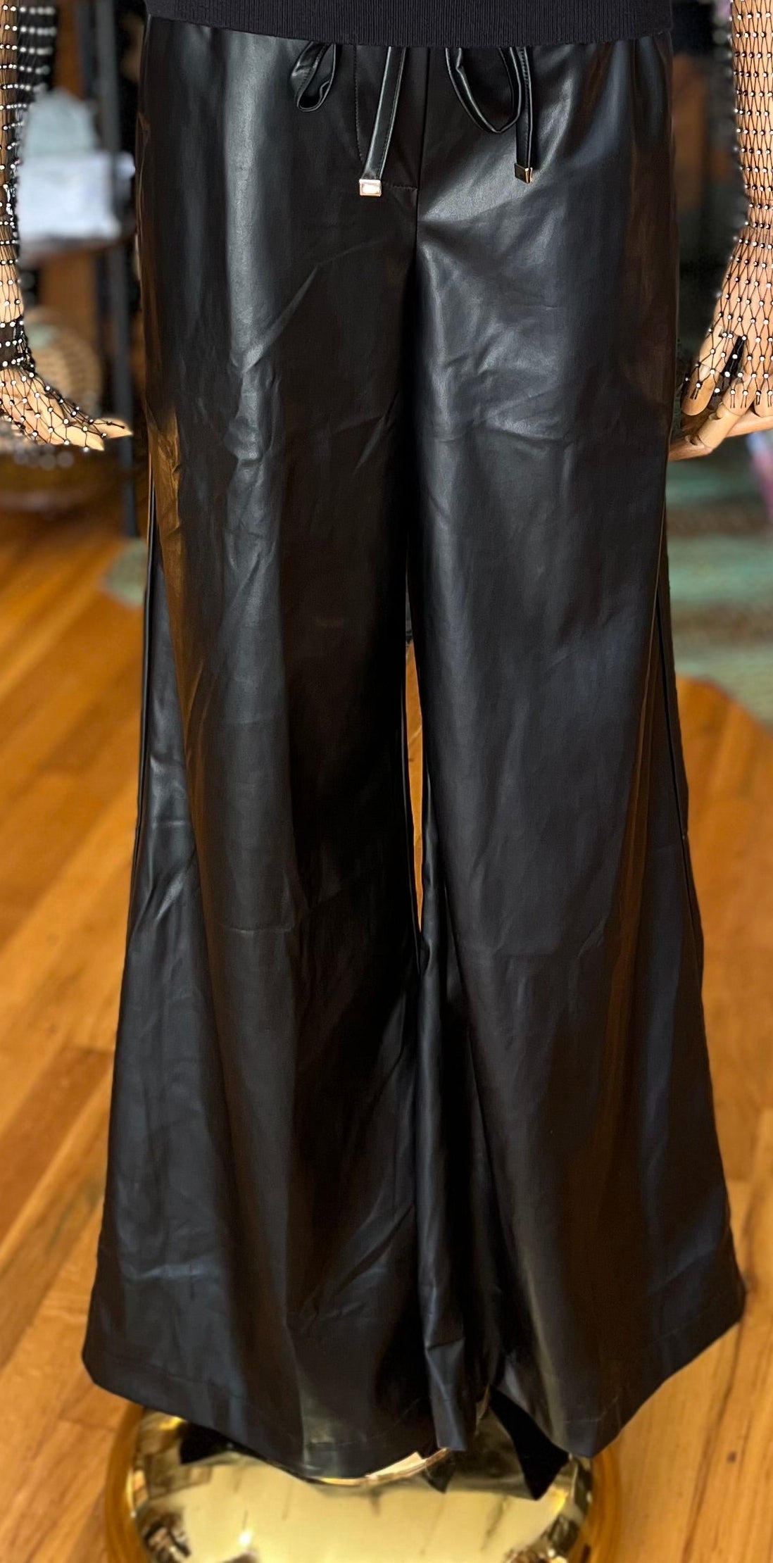 Black leather pull on pants