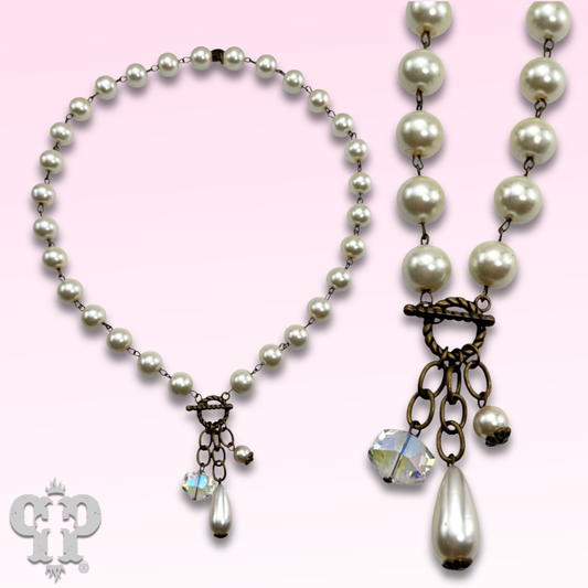 Linked glass pearl necklace with bead charms