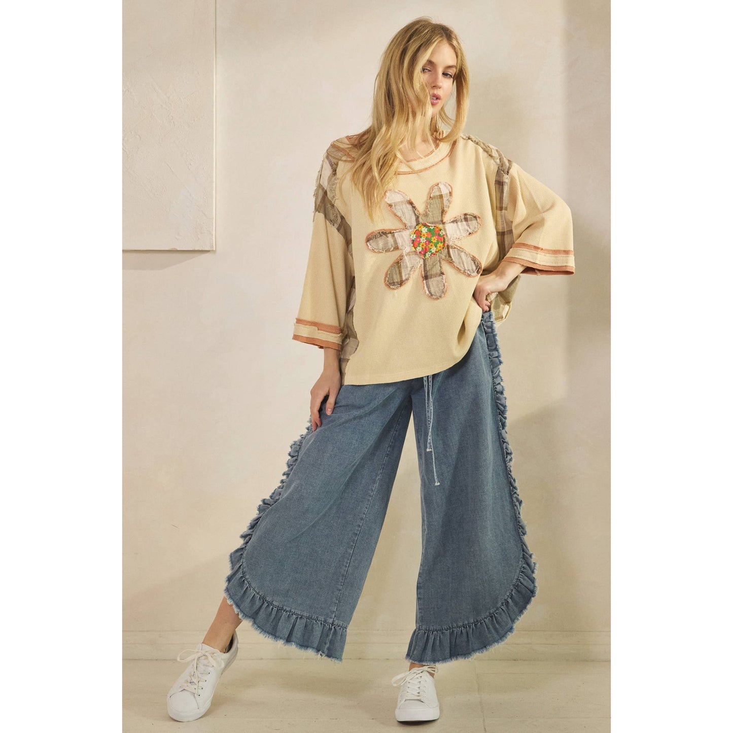 FRAYED RUFFLE HEM DENIM PANTS