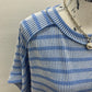 Raised rib striped exposed seam top