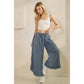 FRAYED RUFFLE HEM DENIM PANTS