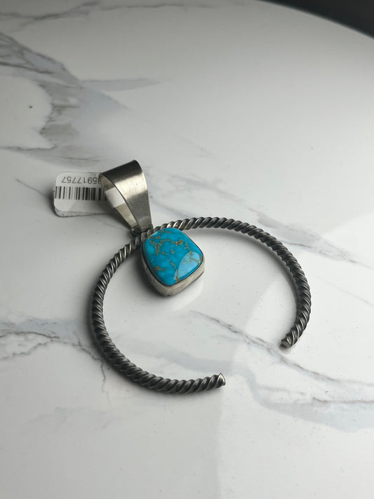 Twisted squash blossom with turquoise stone