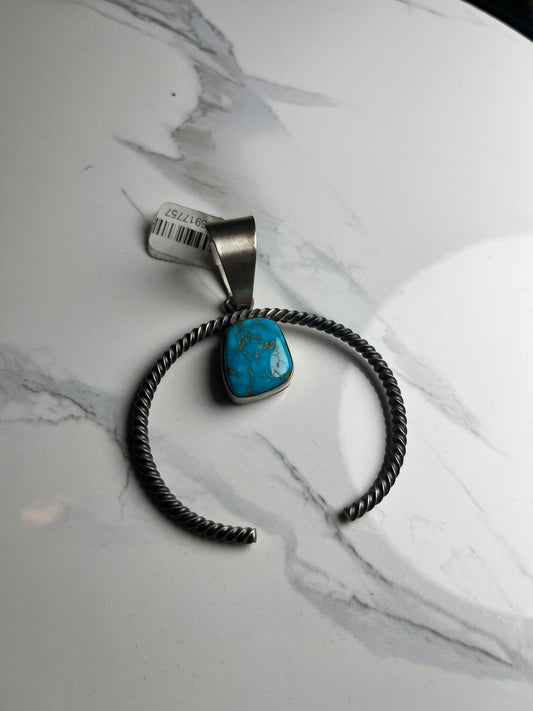 Twisted squash blossom with turquoise stone