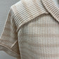 Raised rib striped exposed seam top
