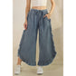 FRAYED RUFFLE HEM DENIM PANTS