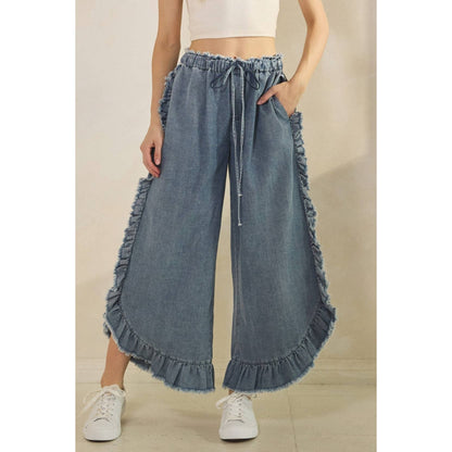FRAYED RUFFLE HEM DENIM PANTS
