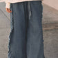 FRAYED RUFFLE HEM DENIM PANTS
