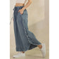 FRAYED RUFFLE HEM DENIM PANTS